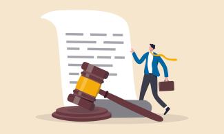 Digital art of a lawyer standing next to a large document and gavel.